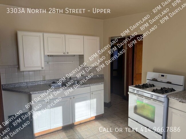 Building Photo - Charming 3-Bedroom, 1-Bathroom Upper Unit ...