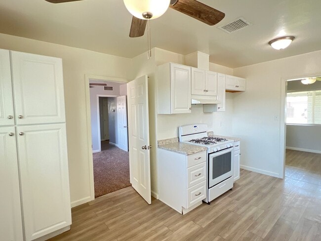 Building Photo - Remodeled 3 Bed Home w/ Fireplace, Garage & Huge Backyard – 93309