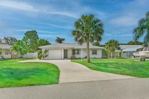 Building Photo - 6159 SE Poinciana Ln