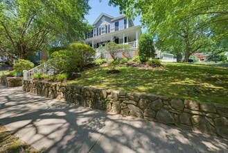 Building Photo - Southern Charm Meets Everyday Entertainment and Convenience!
