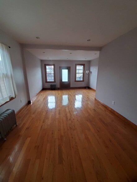 Building Photo - 39-48 65th Place Unit