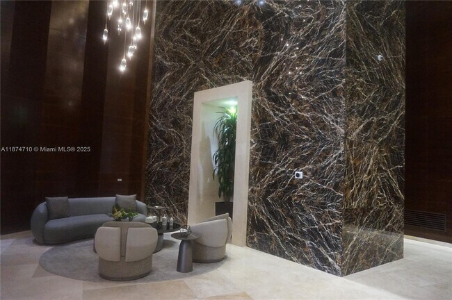 Building Photo - 15811 Collins Ave
