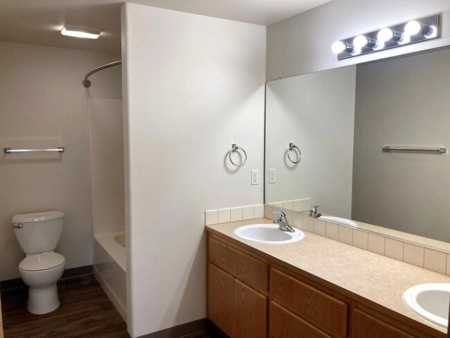 Building Photo - this ranch-style home features 4 bedrooms and 2 bathrooms.