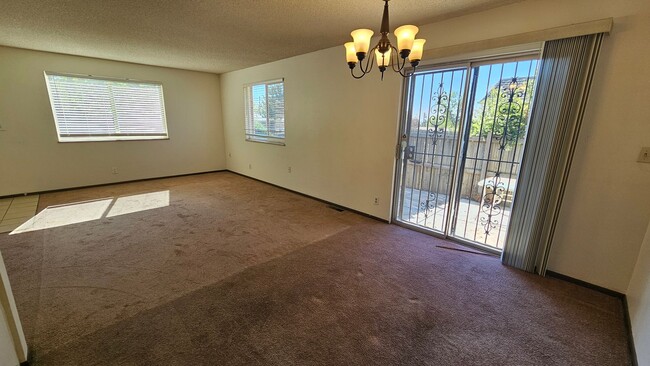 Building Photo - Condo with Garage, Private Patio & Unfinished Basement