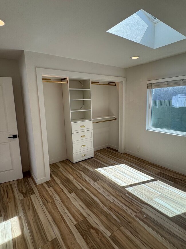 Building Photo - !! MOVE-IN SPECIAL !! Cozy Carson Back House with Skylights & Washer/Dryer