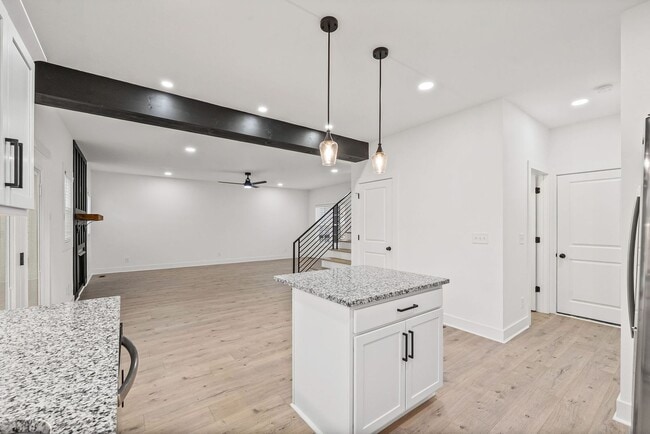 Building Photo - Pet Friendly Three Bedroom with Bonus!