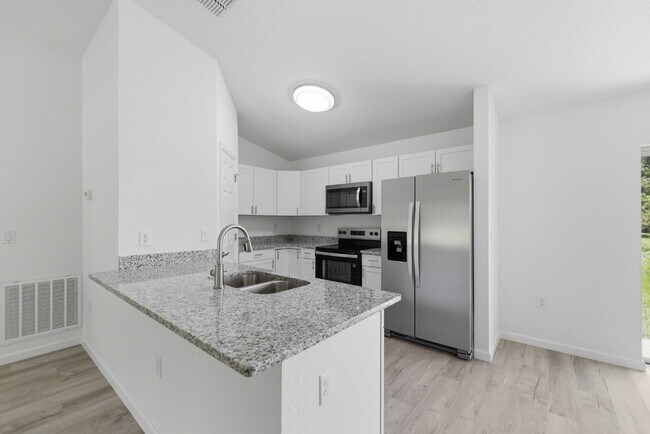 Building Photo - Available Now! New 3/2 Home with Large Backyard and Front Porch