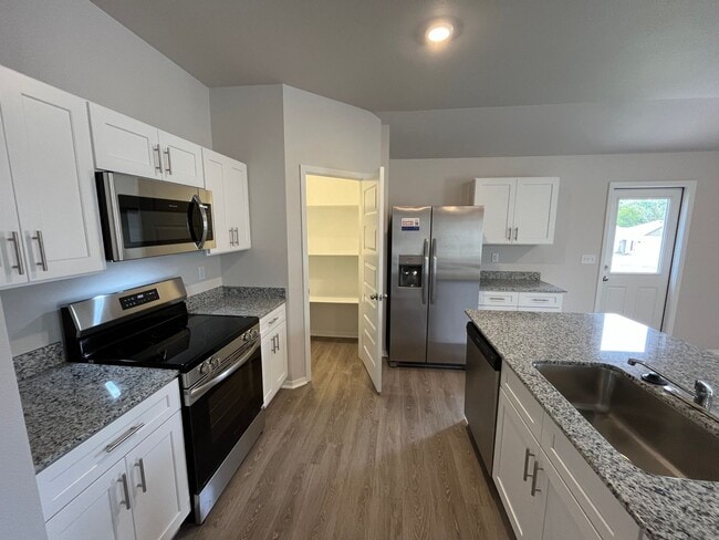 Building Photo - NOW PRELEASING!  NEW Four Bedroom | Two Bath Home in Cottages at Clear Creek