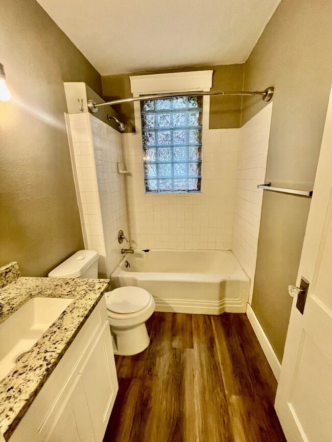 Building Photo - This beautiful 3-bedroom (2 conforming and...