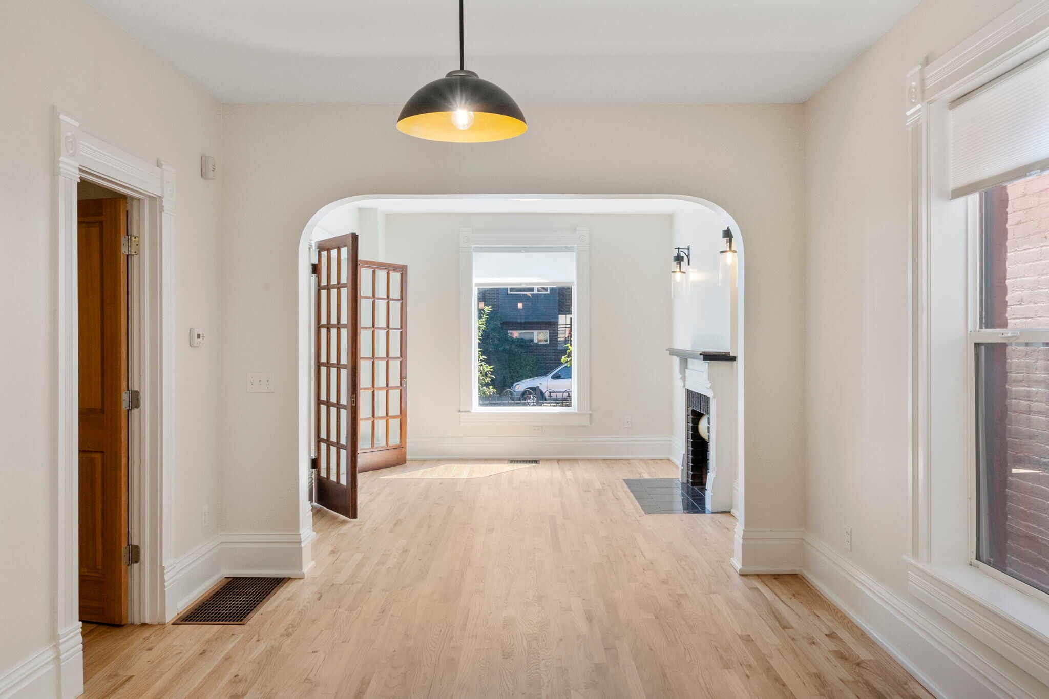 Living room flows into open dining area. - 3347 Tejon St