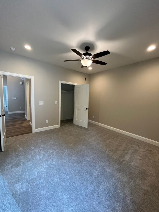 Building Photo - Three bedroom, 2.5 bath newly constructed ...