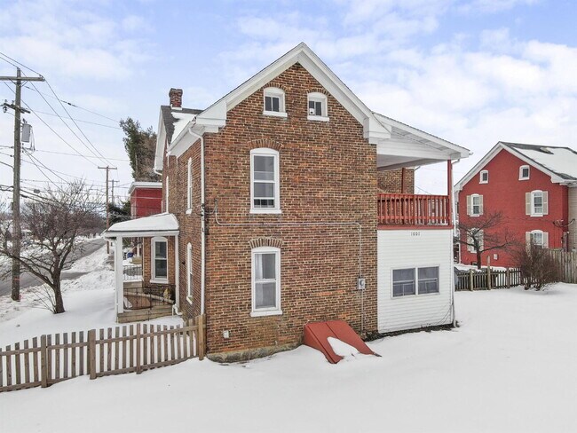Building Photo - Charming 3-Bedroom Single-Family Home with Wrap-Around Porch & Private Fenced Yard