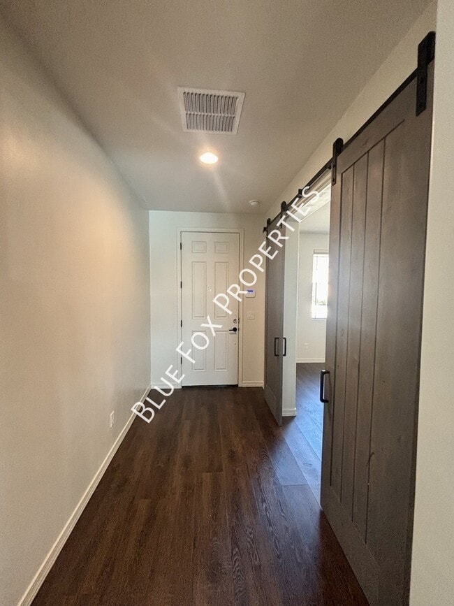 Building Photo - 8454 N Lone Ranger Rd