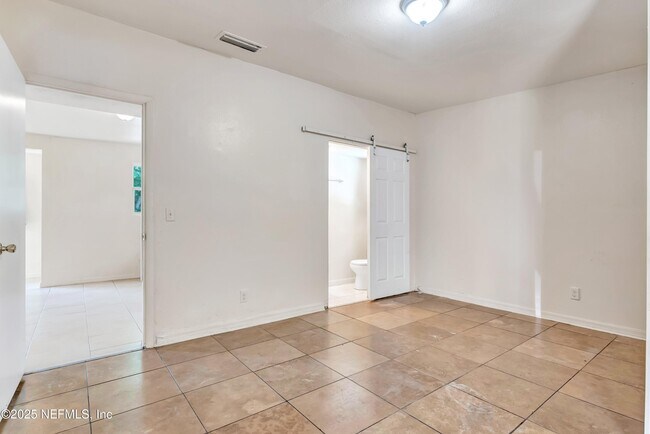 Building Photo - 4407 Melvin Cir E