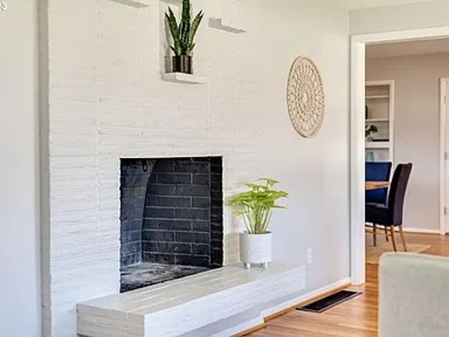 Building Photo - Stylishly Updated Mid-Century Gem on a Qui...
