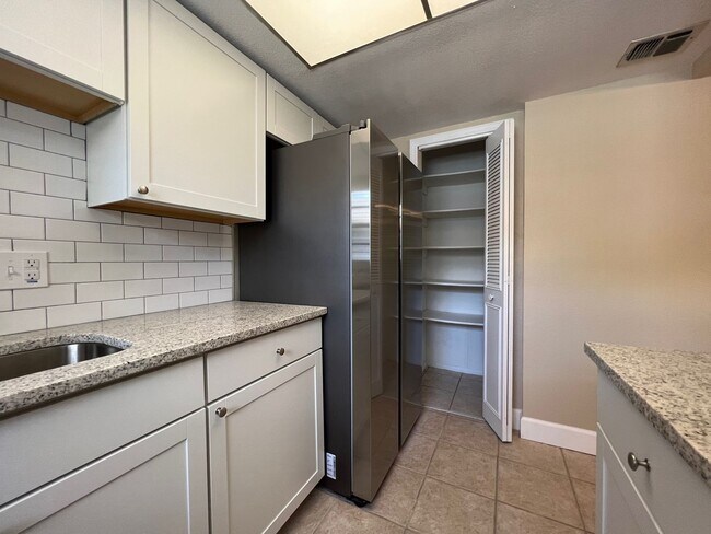 Building Photo - Newly Renovated 3/2 Home ~ Brand New Kitchen ~ Updated Bathrooms ~ Fenced Yard!