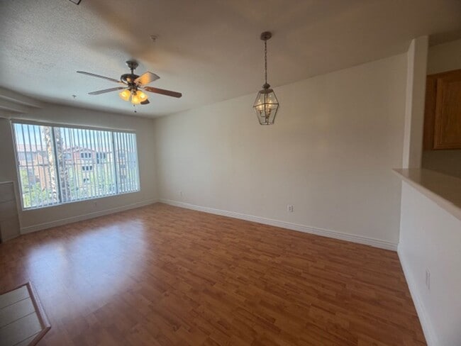 Building Photo - GUARD GATED TOP FLOOR PRIVATE 1 BED CONDO FEATURING A DETACHED 1 CAR GARAGE