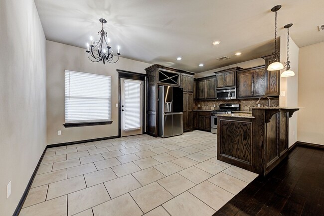 Building Photo - Spacious 3-Bedroom Home in Yukon – Modern ...