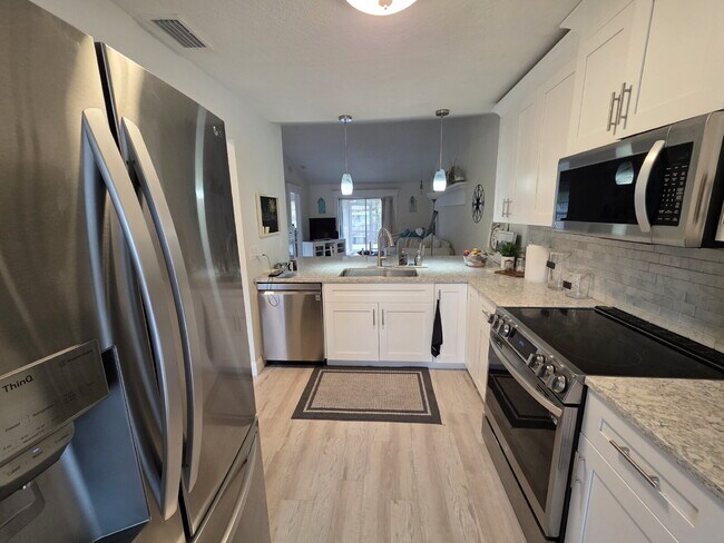 Building Photo - Updated full furnished 2/2 villa in great Safety Harbor location.