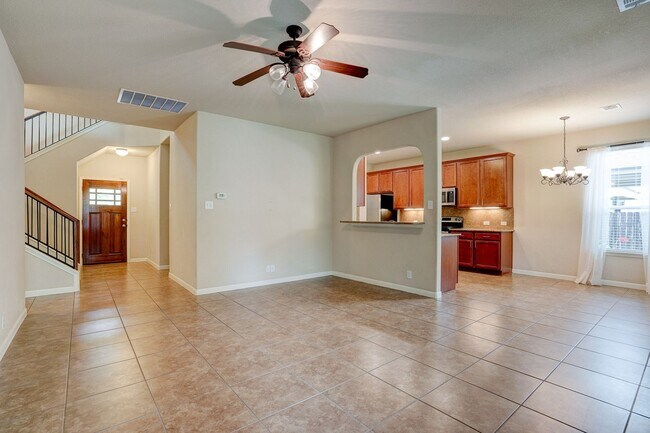 Building Photo - Bright & Roomy 4BR • 2.5BA • Two-Level Living