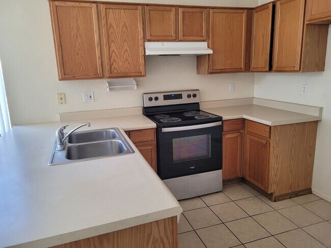 Building Photo - 8817 N 65th Dr