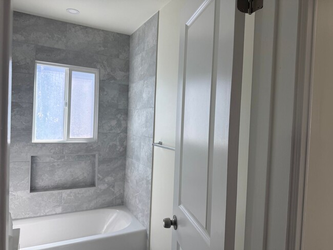 Building Photo - FOR RENT — COMPLETELY REMODELED Apartment