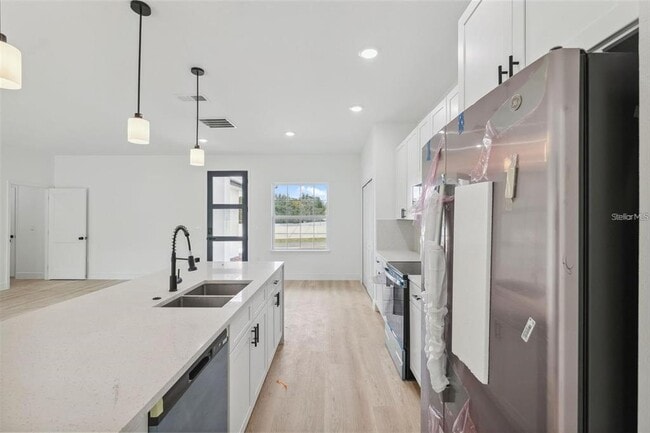 Building Photo - 6175 SW 144th Street Rd