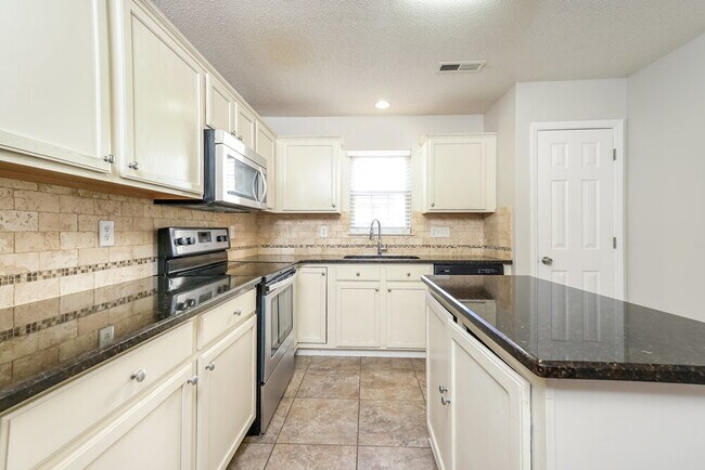 Building Photo - 5209 Carriage Woods Dr