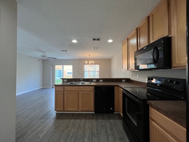 Building Photo - Bright 2BR 2.5BA Home w/ Community Pool/Playground Access • Full-Size Appliances • 1-Car Garage i...