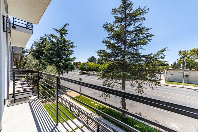 Building Photo - Contemporary 4-Bed, 4.5-Bath Townhome with...