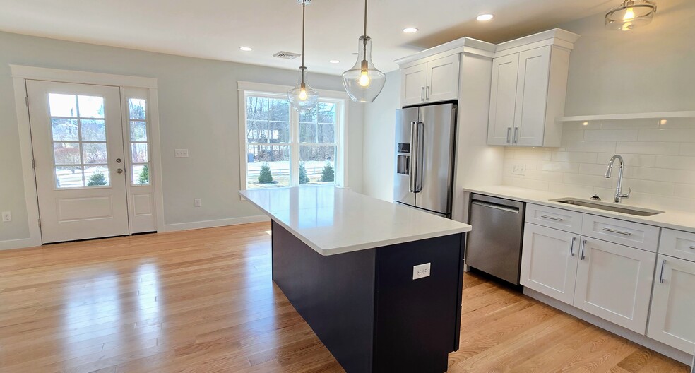 Kitchen with Large Island Workspace - 603 Portsmouth Ave