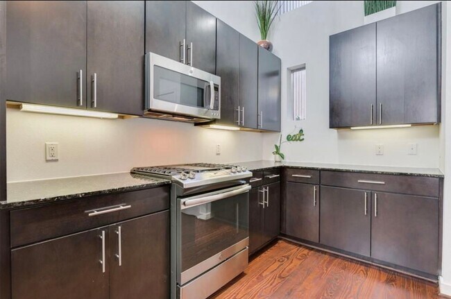 Building Photo - Immaculate 2-Story Urban Loft Townhome wit...