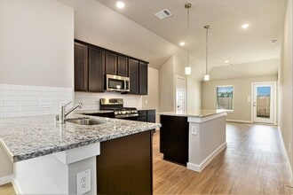 Building Photo - BRAND NEW - NEVER LIVED IN 3 bedroom, 2  bath house in Moran Ranch