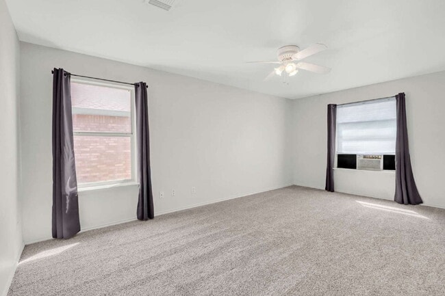 Building Photo - "Spacious 4-Bed, 3-Bath Retreat with Solar Panels!"