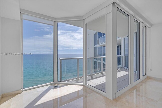 Building Photo - 19333 Collins Ave