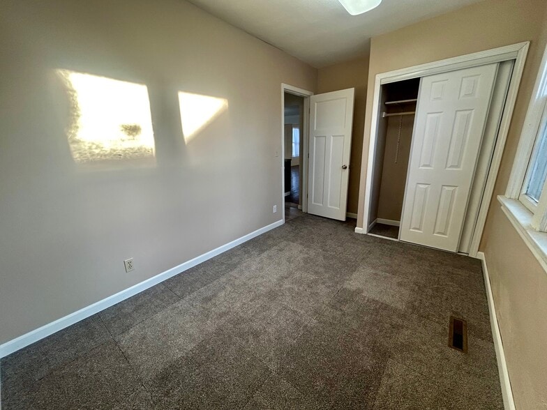Bedroom 2 with BRAND NEW Carpet - 213 Lake Ave W