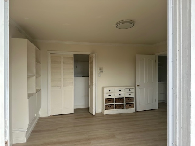 living room with large closet - 18 Arguello Cir