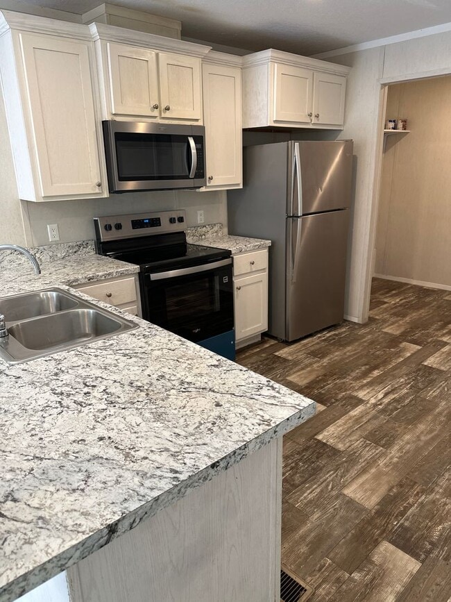 Building Photo - SPECTACULAR PRICE CALL TODAY TO RESERVE!