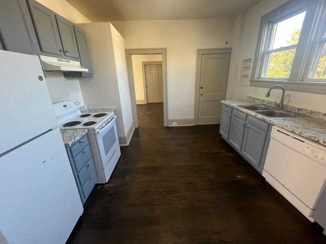 Building Photo - Spacious 4-Bedroom, 2-Bath Home with Porches & Basement