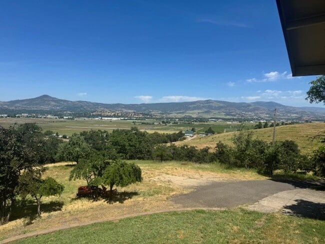 Building Photo - PRIVATE ONE OF KIND THAT SITS ATOP A HILLSIDE W/ VIEWS