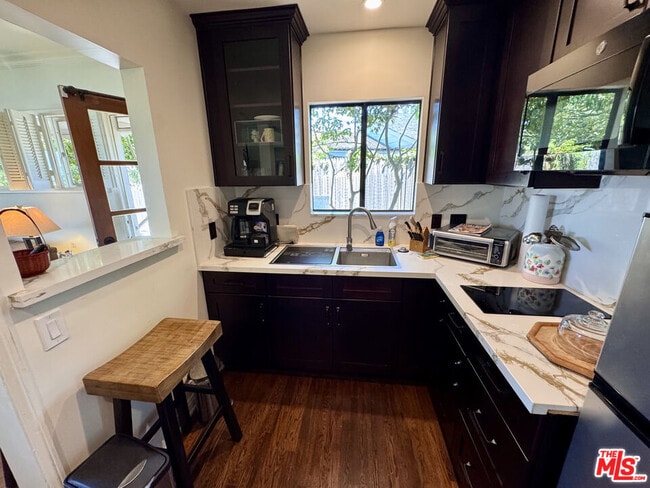 Building Photo - 7756 Torreyson Dr