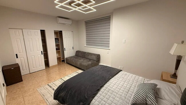 Building Photo - "Charming 1-Bedroom Furnished Apartment with Hardwood Floors in Queens – 750 Sq Ft of Comfort!"