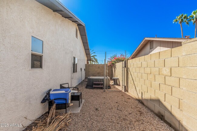 Building Photo - 4950 W Grovers Ave