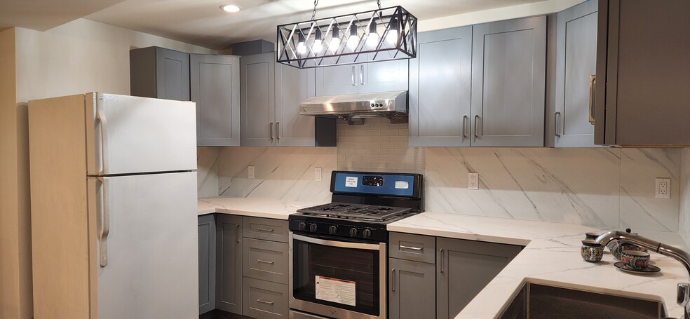 Kitchen with new appliance and Quartz counter top - 2160 22nd Ave