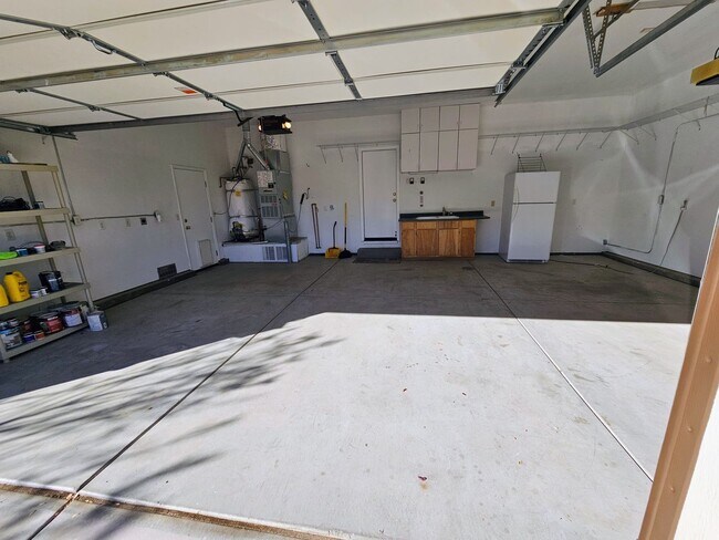 Building Photo - 3 car garage house near Mayberry Park and the Truckee River