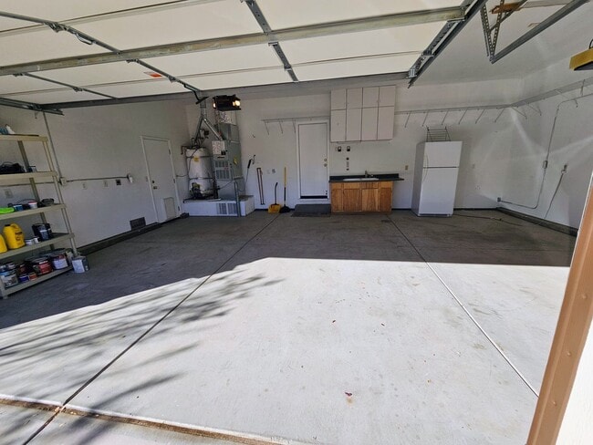 Building Photo - 3 car garage house w/RV parking near the Truckee River