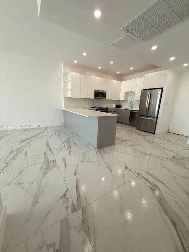 Building Photo - 19370 Collins Ave