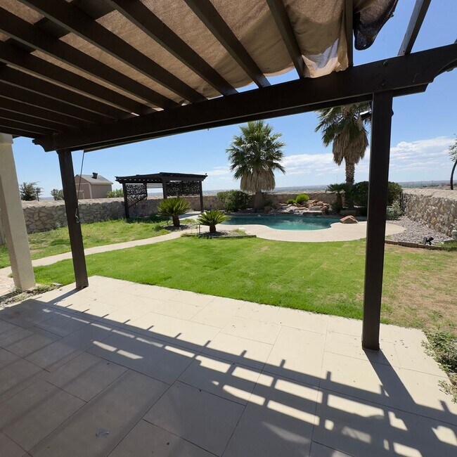 Building Photo - 4 Bedrooms, 3 Baths, a Pool, and Solar Panels!