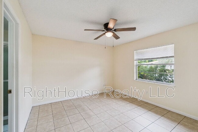 Building Photo - 6144 Rhythm Cir