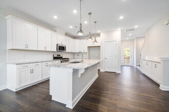Building Photo - Available 08/15! Spacious Townhome in Prime Andrew Chapel Community
